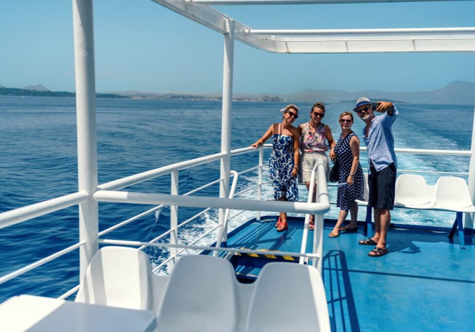 People smiling on a boat trip.