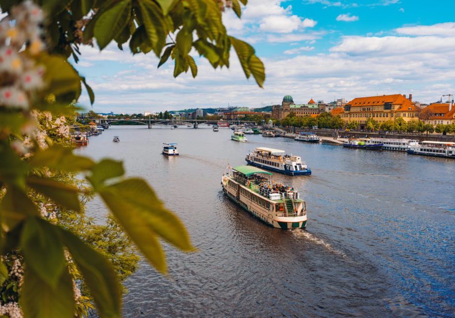 Boats navigating a picturesque river scene